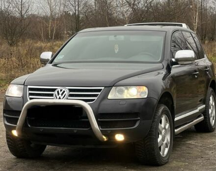 Чорний Фольксваген Туарег, об'ємом двигуна 3 л та пробігом 325 тис. км за 5999 $, фото 2 на Automoto.ua