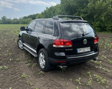 Черный Фольксваген Туарег, объемом двигателя 3.2 л и пробегом 290 тыс. км за 7700 $, фото 3 на Automoto.ua