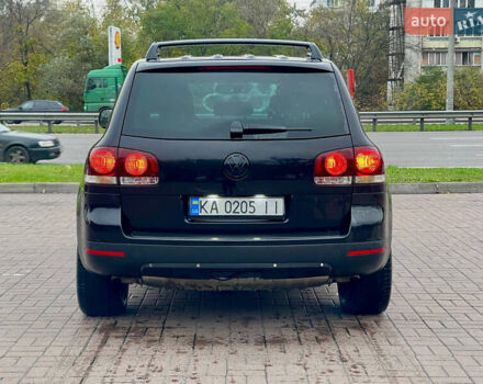 Черный Фольксваген Туарег, объемом двигателя 2.46 л и пробегом 249 тыс. км за 7800 $, фото 4 на Automoto.ua