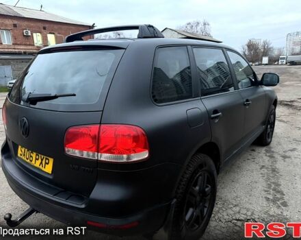 Чорний Фольксваген Туарег, об'ємом двигуна 3 л та пробігом 277 тис. км за 4300 $, фото 4 на Automoto.ua