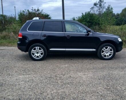 Черный Фольксваген Туарег, объемом двигателя 3 л и пробегом 408 тыс. км за 10500 $, фото 1 на Automoto.ua