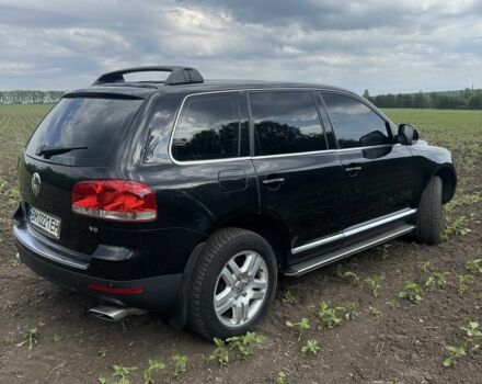 Черный Фольксваген Туарег, объемом двигателя 3.2 л и пробегом 290 тыс. км за 7700 $, фото 2 на Automoto.ua