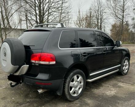 Чорний Фольксваген Туарег, об'ємом двигуна 3 л та пробігом 325 тис. км за 5999 $, фото 5 на Automoto.ua