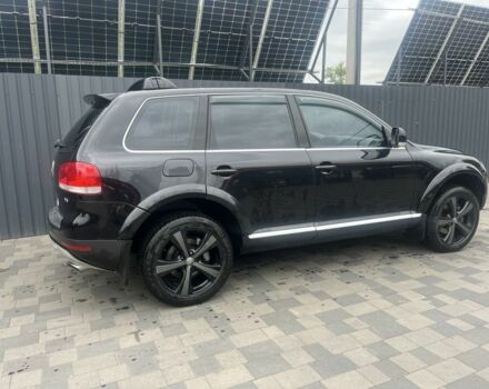 Черный Фольксваген Туарег, объемом двигателя 4.2 л и пробегом 250 тыс. км за 7777 $, фото 5 на Automoto.ua