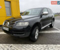 Черный Фольксваген Туарег, объемом двигателя 2.97 л и пробегом 329 тыс. км за 9500 $, фото 1 на Automoto.ua