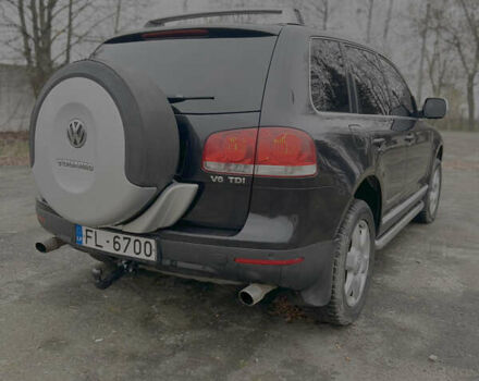 Черный Фольксваген Туарег, объемом двигателя 3 л и пробегом 325 тыс. км за 5900 $, фото 7 на Automoto.ua