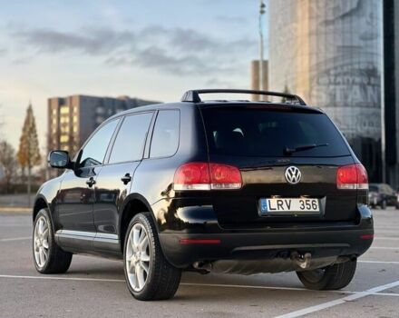 Черный Фольксваген Туарег, объемом двигателя 3 л и пробегом 300 тыс. км за 6500 $, фото 23 на Automoto.ua