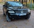 Черный Фольксваген Туарег, объемом двигателя 2.5 л и пробегом 240 тыс. км за 9999 $, фото 1 на Automoto.ua