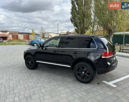 Черный Фольксваген Туарег, объемом двигателя 2.97 л и пробегом 325 тыс. км за 8850 $, фото 21 на Automoto.ua