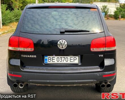 Черный Фольксваген Туарег, объемом двигателя 3.2 л и пробегом 243 тыс. км за 8500 $, фото 3 на Automoto.ua