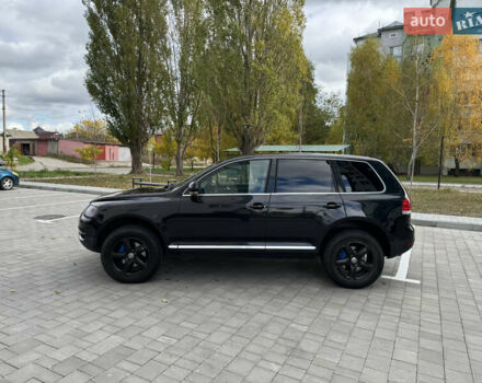 Черный Фольксваген Туарег, объемом двигателя 2.97 л и пробегом 325 тыс. км за 8850 $, фото 9 на Automoto.ua