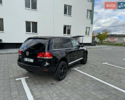 Черный Фольксваген Туарег, объемом двигателя 2.97 л и пробегом 325 тыс. км за 8850 $, фото 4 на Automoto.ua