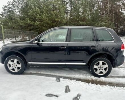 Черный Фольксваген Туарег, объемом двигателя 3 л и пробегом 295 тыс. км за 3636 $, фото 4 на Automoto.ua