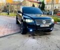 Черный Фольксваген Туарег, объемом двигателя 3 л и пробегом 386 тыс. км за 8200 $, фото 1 на Automoto.ua