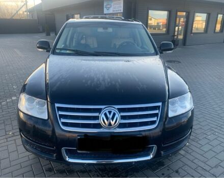 Чорний Фольксваген Туарег, об'ємом двигуна 5 л та пробігом 370 тис. км за 4200 $, фото 1 на Automoto.ua