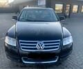 Чорний Фольксваген Туарег, об'ємом двигуна 5 л та пробігом 370 тис. км за 4200 $, фото 1 на Automoto.ua