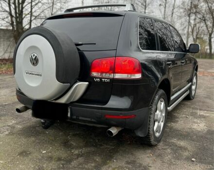 Чорний Фольксваген Туарег, об'ємом двигуна 3 л та пробігом 325 тис. км за 5999 $, фото 6 на Automoto.ua