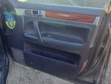 Черный Фольксваген Туарег, объемом двигателя 4.92 л и пробегом 210 тыс. км за 2999 $, фото 3 на Automoto.ua