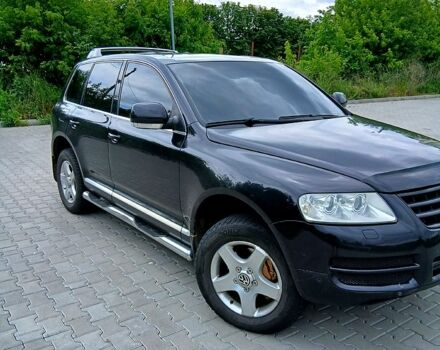 Черный Фольксваген Туарег, объемом двигателя 3.2 л и пробегом 303 тыс. км за 8950 $, фото 2 на Automoto.ua