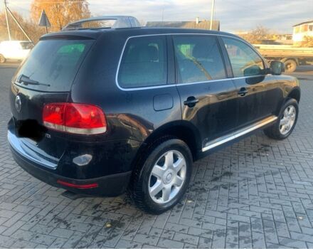 Чорний Фольксваген Туарег, об'ємом двигуна 5 л та пробігом 370 тис. км за 4200 $, фото 4 на Automoto.ua