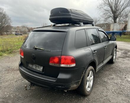 Чорний Фольксваген Туарег, об'ємом двигуна 3 л та пробігом 496 тис. км за 4250 $, фото 5 на Automoto.ua