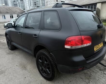 Черный Фольксваген Туарег, объемом двигателя 3 л и пробегом 277 тыс. км за 4300 $, фото 1 на Automoto.ua