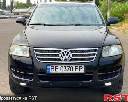 Черный Фольксваген Туарег, объемом двигателя 3.2 л и пробегом 243 тыс. км за 8500 $, фото 1 на Automoto.ua