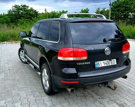 Черный Фольксваген Туарег, объемом двигателя 3.2 л и пробегом 303 тыс. км за 8950 $, фото 3 на Automoto.ua