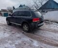 Черный Фольксваген Туарег, объемом двигателя 4.2 л и пробегом 200 тыс. км за 6000 $, фото 12 на Automoto.ua
