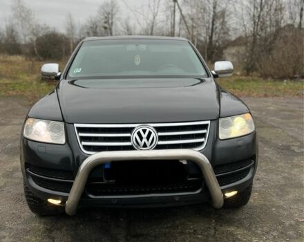 Чорний Фольксваген Туарег, об'ємом двигуна 3 л та пробігом 325 тис. км за 5999 $, фото 4 на Automoto.ua