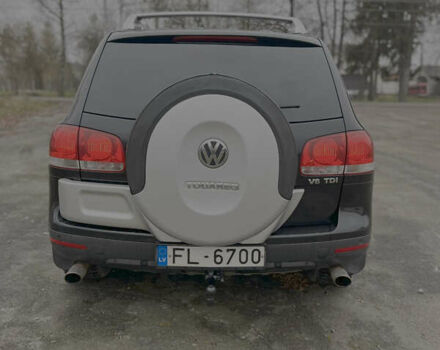 Черный Фольксваген Туарег, объемом двигателя 3 л и пробегом 325 тыс. км за 5900 $, фото 6 на Automoto.ua