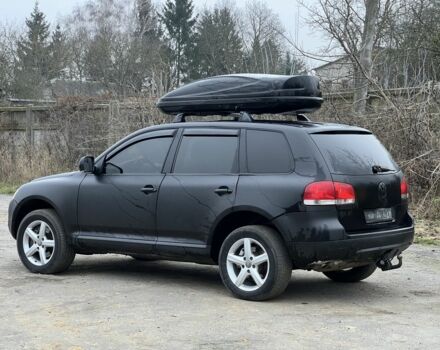 Чорний Фольксваген Туарег, об'ємом двигуна 3 л та пробігом 496 тис. км за 3999 $, фото 2 на Automoto.ua