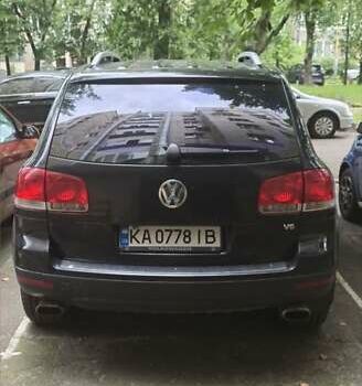 Черный Фольксваген Туарег, объемом двигателя 3.2 л и пробегом 360 тыс. км за 9500 $, фото 1 на Automoto.ua