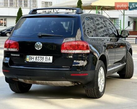 Черный Фольксваген Туарег, объемом двигателя 3.2 л и пробегом 165 тыс. км за 9999 $, фото 5 на Automoto.ua