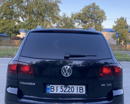 Черный Фольксваген Туарег, объемом двигателя 3 л и пробегом 340 тыс. км за 11000 $, фото 5 на Automoto.ua