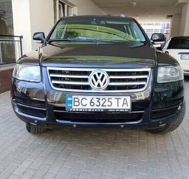 Чорний Фольксваген Туарег, об'ємом двигуна 3 л та пробігом 365 тис. км за 10700 $, фото 2 на Automoto.ua