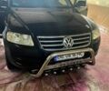 Черный Фольксваген Туарег, объемом двигателя 3 л и пробегом 390 тыс. км за 9500 $, фото 2 на Automoto.ua