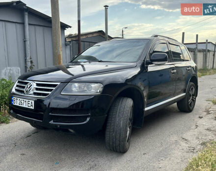 Чорний Фольксваген Туарег, об'ємом двигуна 3 л та пробігом 230 тис. км за 14000 $, фото 3 на Automoto.ua