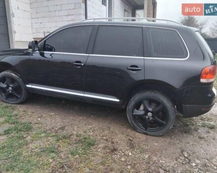 Чорний Фольксваген Туарег, об'ємом двигуна 3 л та пробігом 318 тис. км за 9200 $, фото 5 на Automoto.ua