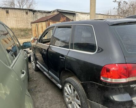 Чорний Фольксваген Туарег, об'ємом двигуна 3 л та пробігом 127 тис. км за 1599 $, фото 2 на Automoto.ua