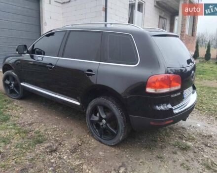 Чорний Фольксваген Туарег, об'ємом двигуна 3 л та пробігом 318 тис. км за 9200 $, фото 6 на Automoto.ua