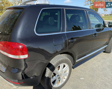 Черный Фольксваген Туарег, объемом двигателя 3 л и пробегом 340 тыс. км за 7500 $, фото 2 на Automoto.ua