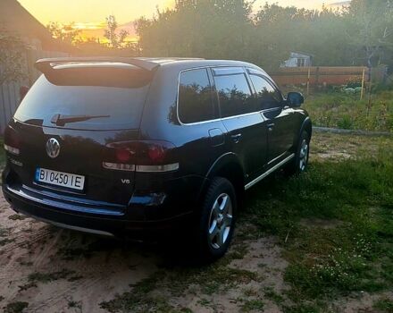 Черный Фольксваген Туарег, объемом двигателя 3.2 л и пробегом 355 тыс. км за 8300 $, фото 1 на Automoto.ua