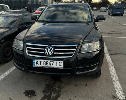 Черный Фольксваген Туарег, объемом двигателя 2.46 л и пробегом 325 тыс. км за 8700 $, фото 2 на Automoto.ua