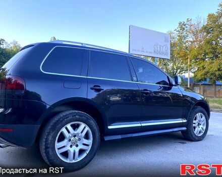 Черный Фольксваген Туарег, объемом двигателя 3 л и пробегом 340 тыс. км за 10800 $, фото 4 на Automoto.ua