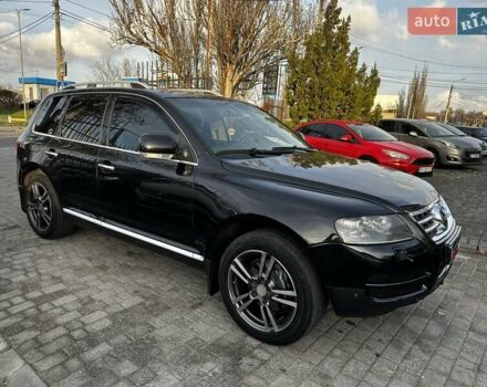 Черный Фольксваген Туарег, объемом двигателя 3 л и пробегом 250 тыс. км за 9700 $, фото 1 на Automoto.ua