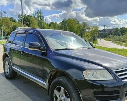 Черный Фольксваген Туарег, объемом двигателя 3 л и пробегом 292 тыс. км за 11500 $, фото 1 на Automoto.ua