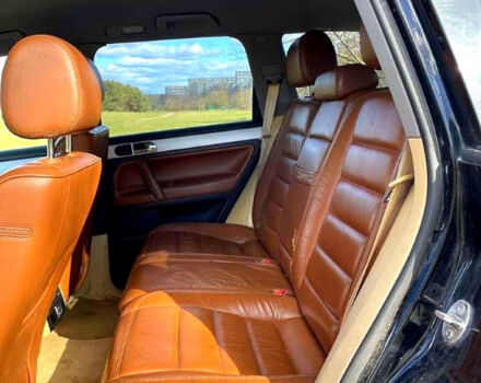 Черный Фольксваген Туарег, объемом двигателя 3 л и пробегом 357 тыс. км за 7440 $, фото 6 на Automoto.ua