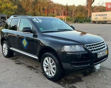 Черный Фольксваген Туарег, объемом двигателя 3 л и пробегом 260 тыс. км за 6000 $, фото 1 на Automoto.ua