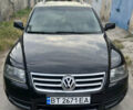 Чорний Фольксваген Туарег, об'ємом двигуна 3 л та пробігом 230 тис. км за 14000 $, фото 2 на Automoto.ua